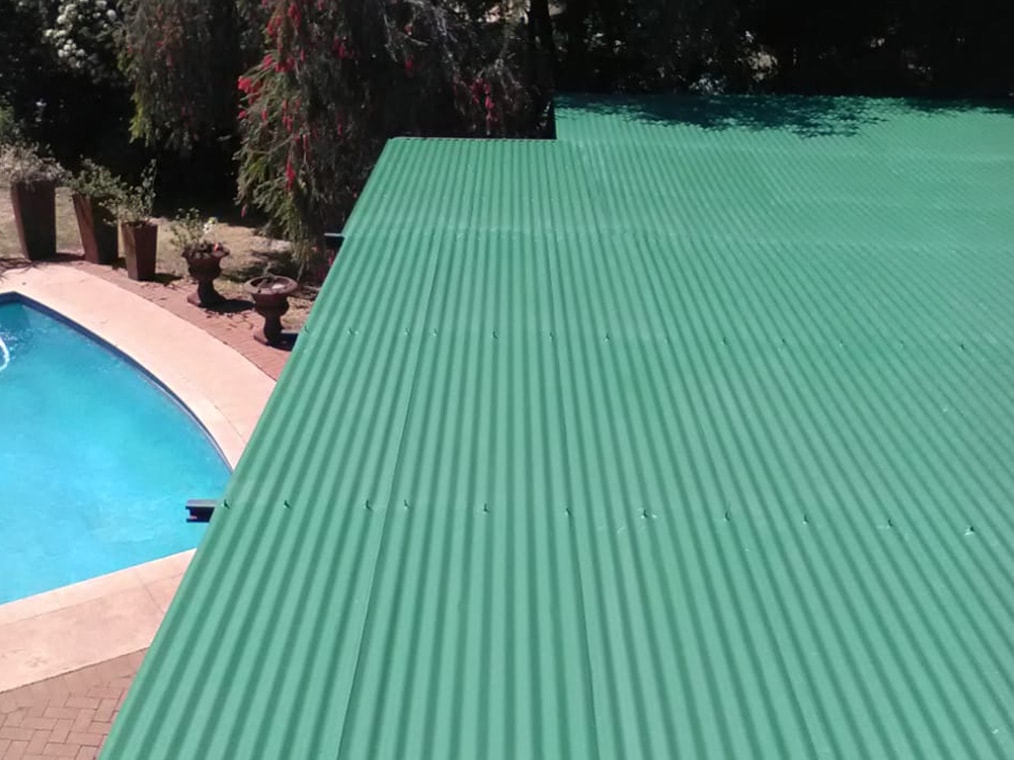 roof_repair_rubberroofs_after_green_pool